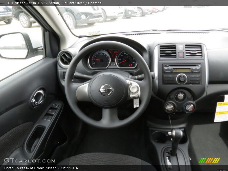 Brilliant Silver / Charcoal 2013 Nissan Versa 1.6 SV Sedan
