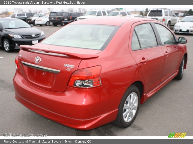 Barcelona Red Metallic / Bisque 2010 Toyota Yaris Sedan