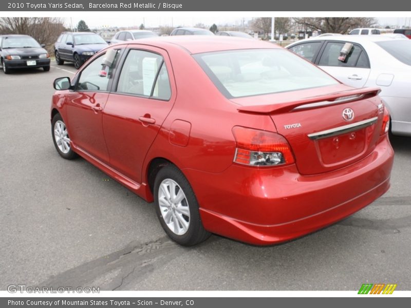Barcelona Red Metallic / Bisque 2010 Toyota Yaris Sedan