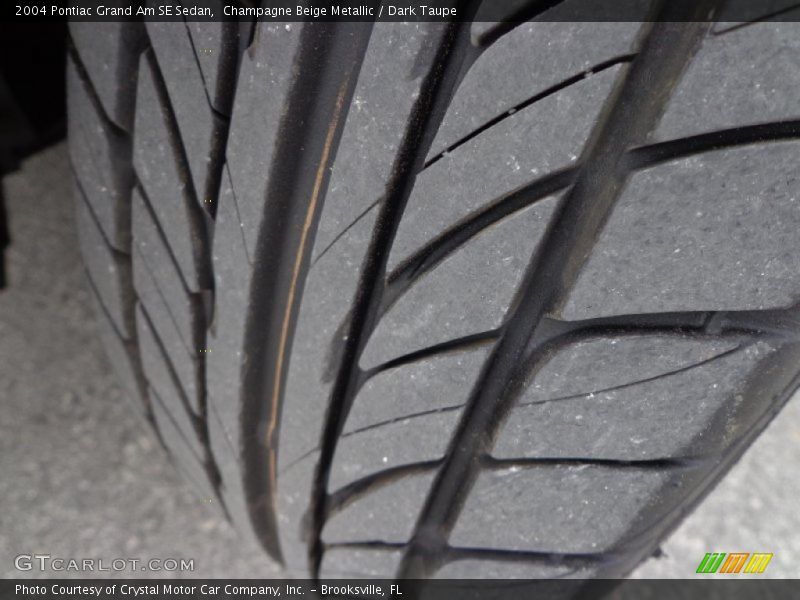 Champagne Beige Metallic / Dark Taupe 2004 Pontiac Grand Am SE Sedan