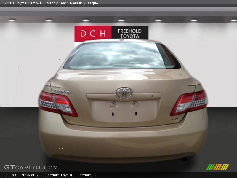Sandy Beach Metallic / Bisque 2010 Toyota Camry LE