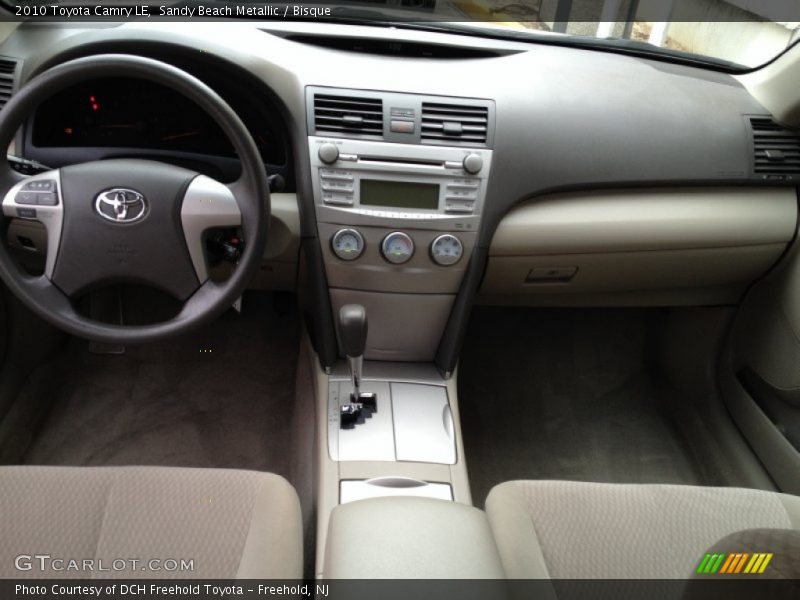 Sandy Beach Metallic / Bisque 2010 Toyota Camry LE