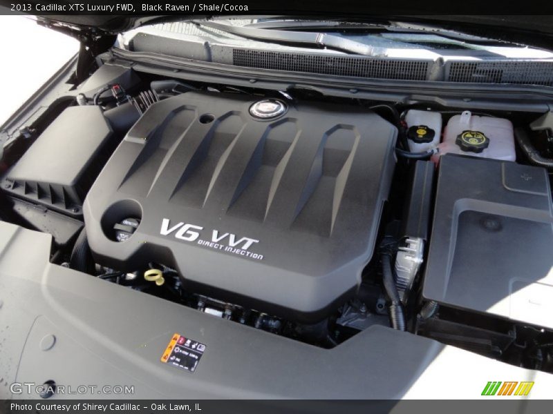Black Raven / Shale/Cocoa 2013 Cadillac XTS Luxury FWD