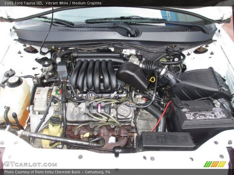 Vibrant White / Medium Graphite 2002 Ford Taurus SES