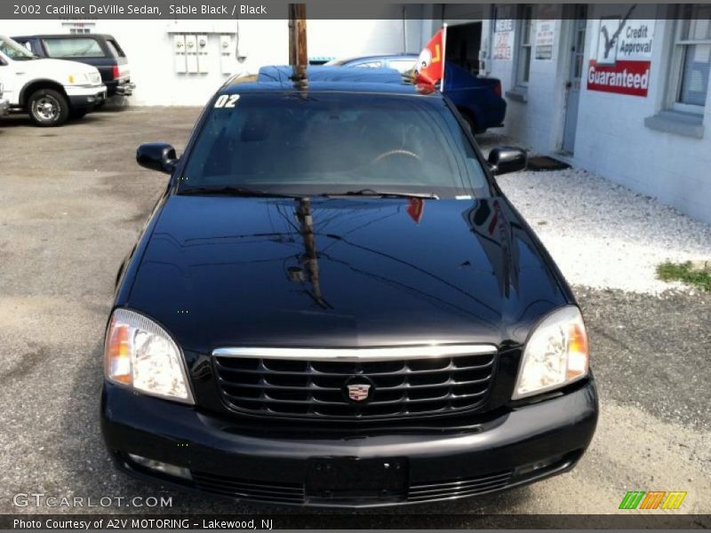 Sable Black / Black 2002 Cadillac DeVille Sedan