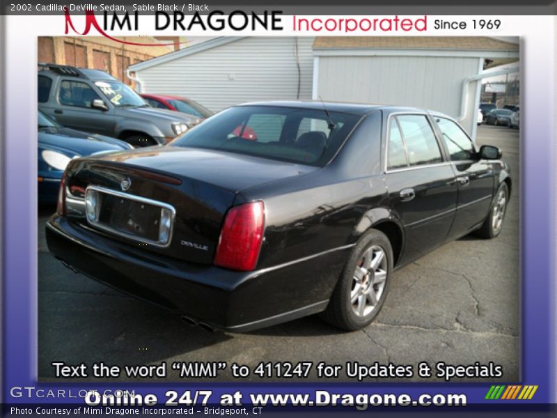 Sable Black / Black 2002 Cadillac DeVille Sedan