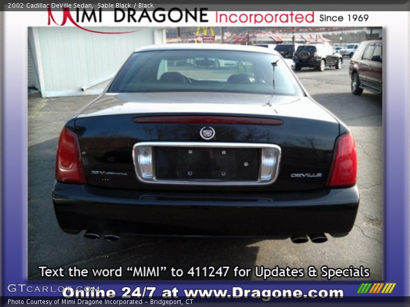 Sable Black / Black 2002 Cadillac DeVille Sedan