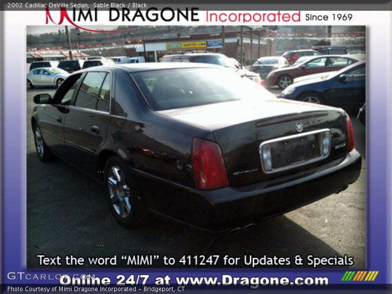 Sable Black / Black 2002 Cadillac DeVille Sedan