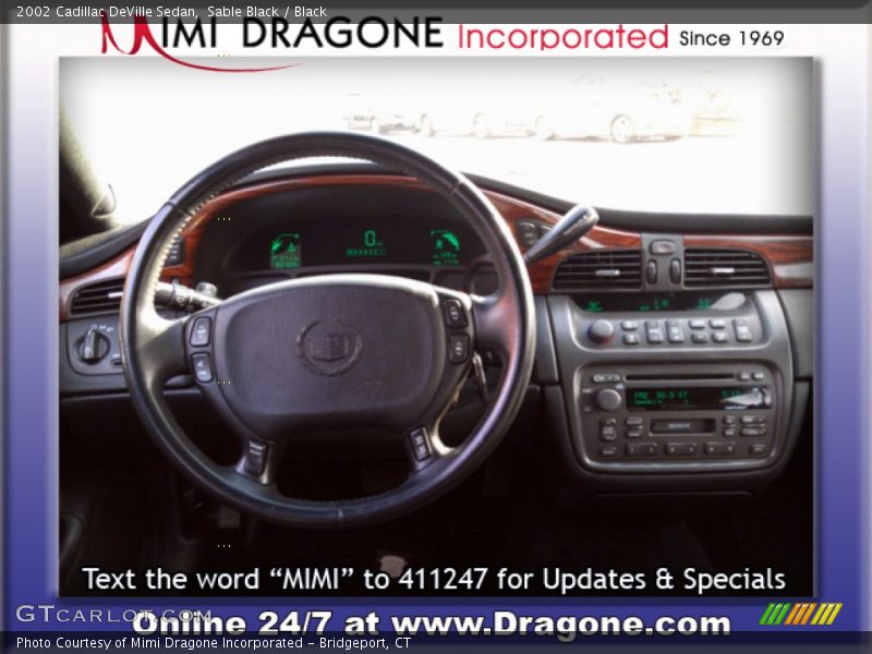 Sable Black / Black 2002 Cadillac DeVille Sedan