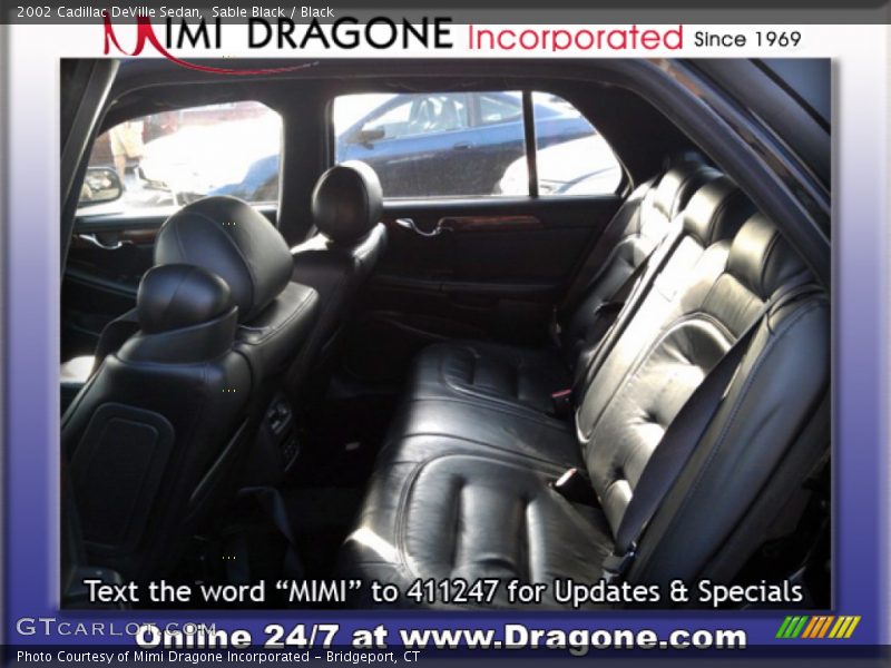 Sable Black / Black 2002 Cadillac DeVille Sedan