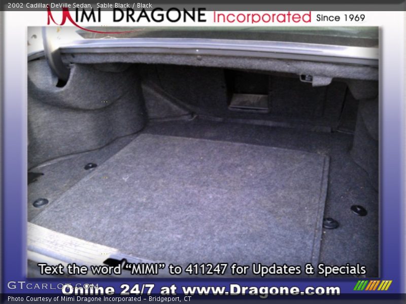 Sable Black / Black 2002 Cadillac DeVille Sedan