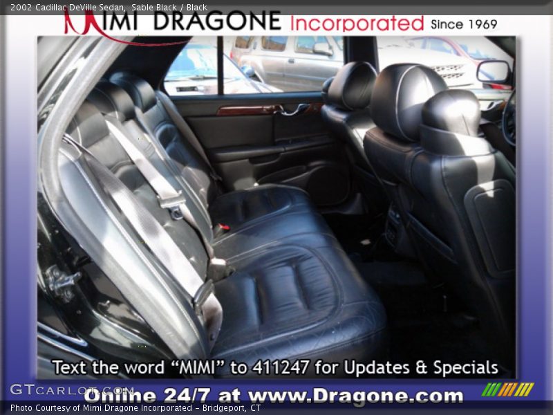 Sable Black / Black 2002 Cadillac DeVille Sedan