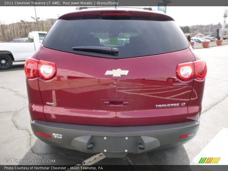Red Jewel Metallic / Ebony/Ebony 2011 Chevrolet Traverse LT AWD
