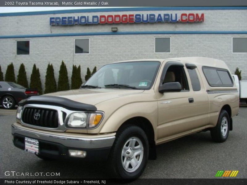 Mystic Gold Metallic / Oak 2002 Toyota Tacoma Xtracab