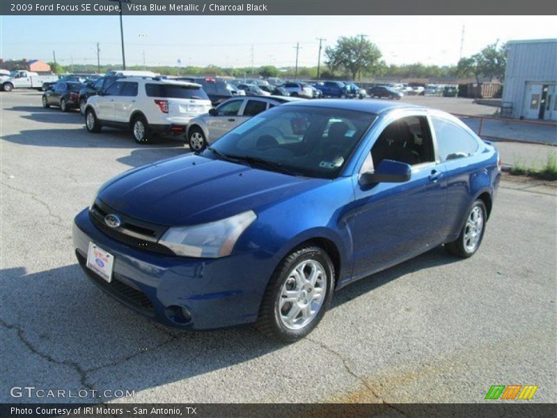 Vista Blue Metallic / Charcoal Black 2009 Ford Focus SE Coupe