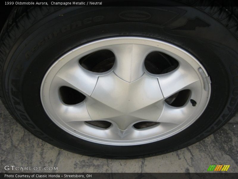 Champagne Metallic / Neutral 1999 Oldsmobile Aurora