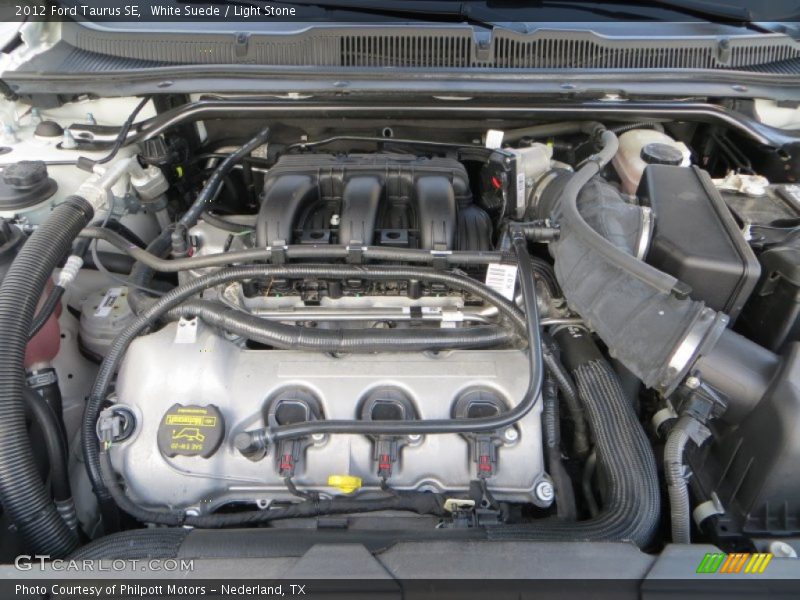 White Suede / Light Stone 2012 Ford Taurus SE