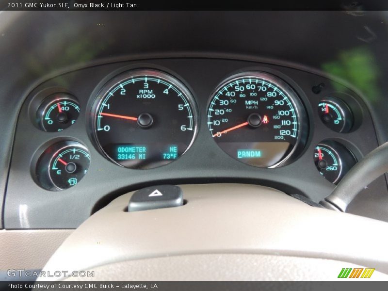 Onyx Black / Light Tan 2011 GMC Yukon SLE