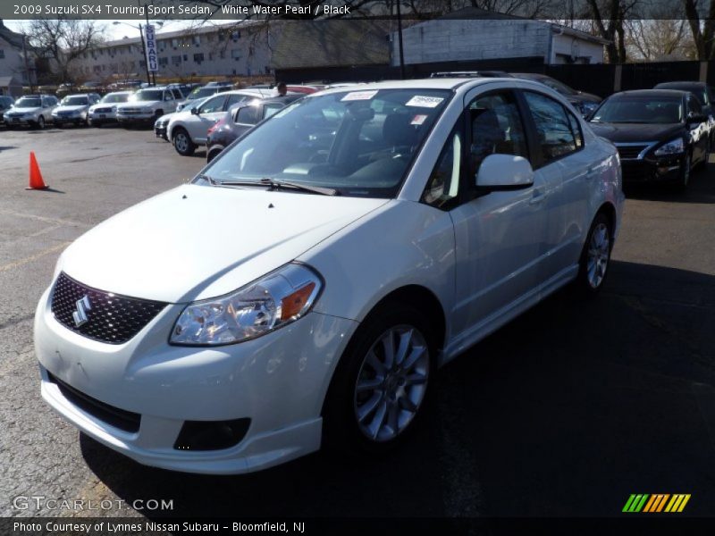 White Water Pearl / Black 2009 Suzuki SX4 Touring Sport Sedan