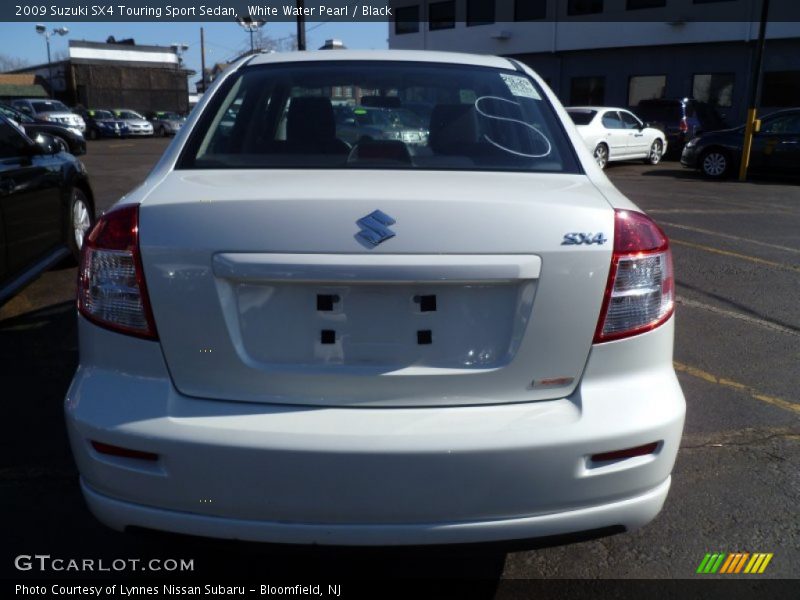 White Water Pearl / Black 2009 Suzuki SX4 Touring Sport Sedan