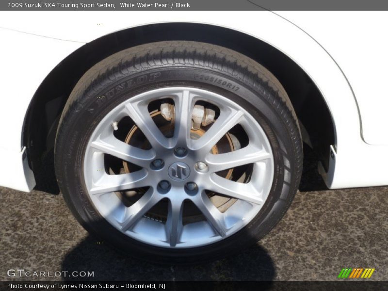 White Water Pearl / Black 2009 Suzuki SX4 Touring Sport Sedan