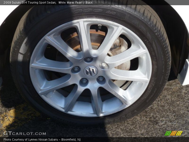 White Water Pearl / Black 2009 Suzuki SX4 Touring Sport Sedan