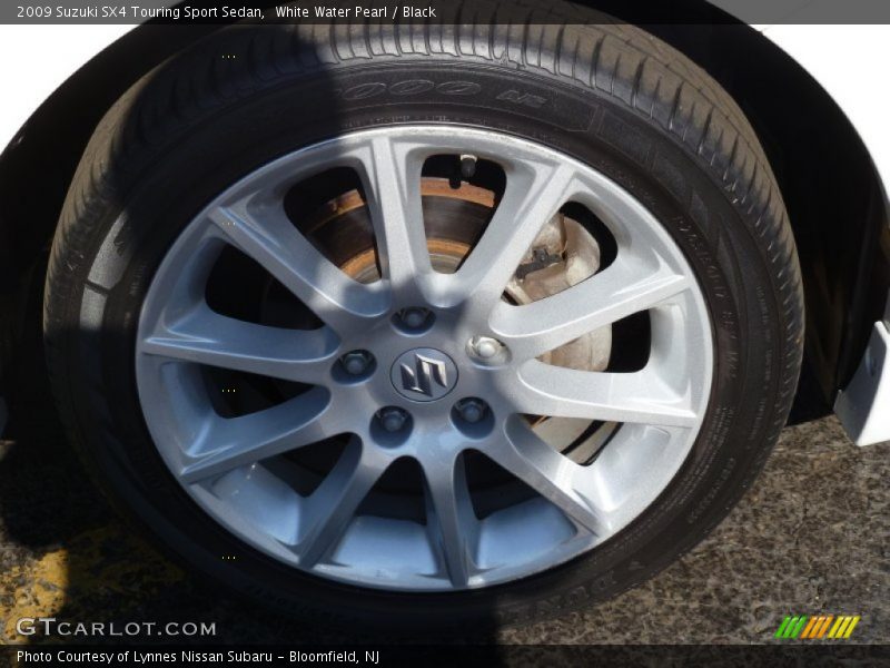 White Water Pearl / Black 2009 Suzuki SX4 Touring Sport Sedan