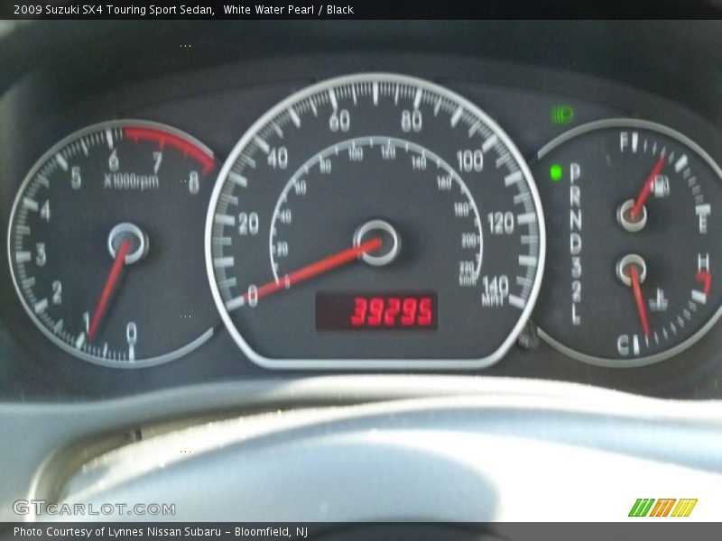 White Water Pearl / Black 2009 Suzuki SX4 Touring Sport Sedan