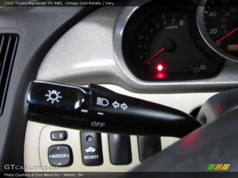 Vintage Gold Metallic / Ivory 2002 Toyota Highlander V6 4WD