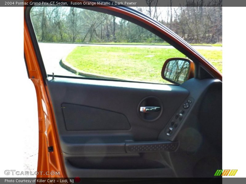 Fusion Orange Metallic / Dark Pewter 2004 Pontiac Grand Prix GT Sedan