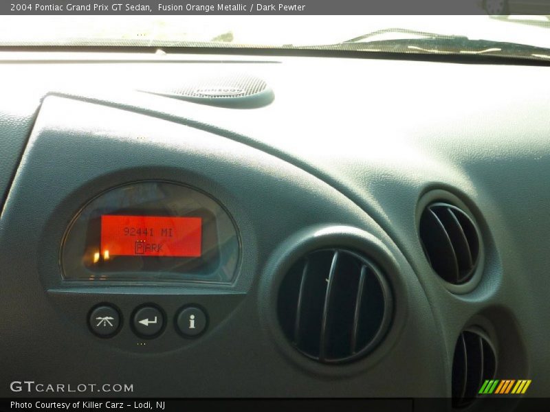 Fusion Orange Metallic / Dark Pewter 2004 Pontiac Grand Prix GT Sedan