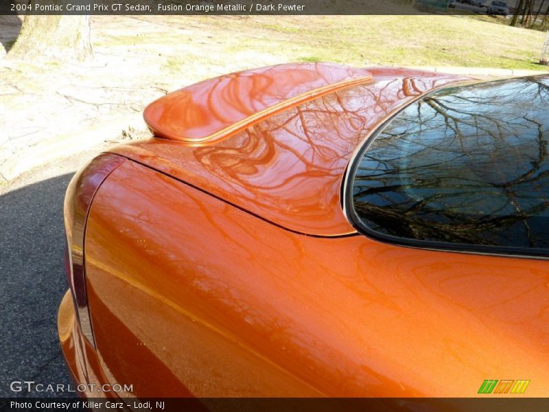 Fusion Orange Metallic / Dark Pewter 2004 Pontiac Grand Prix GT Sedan