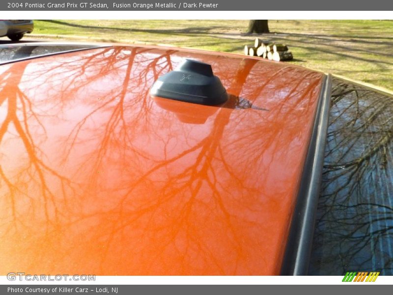 Fusion Orange Metallic / Dark Pewter 2004 Pontiac Grand Prix GT Sedan