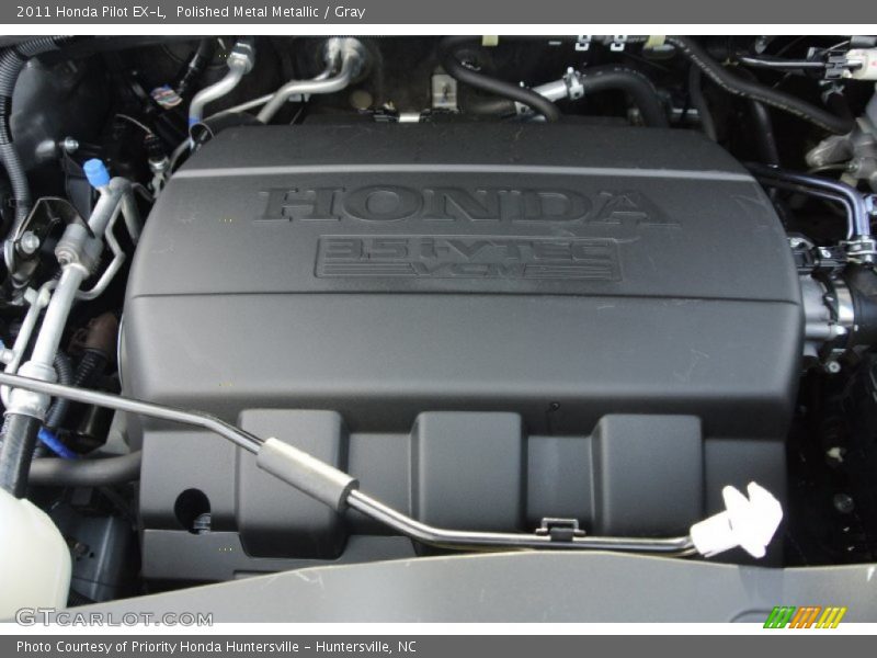 Polished Metal Metallic / Gray 2011 Honda Pilot EX-L