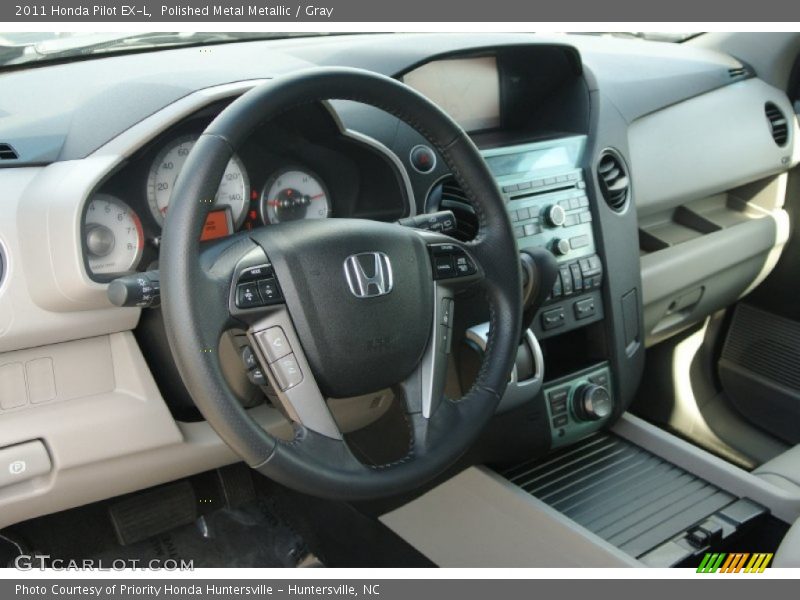 Polished Metal Metallic / Gray 2011 Honda Pilot EX-L