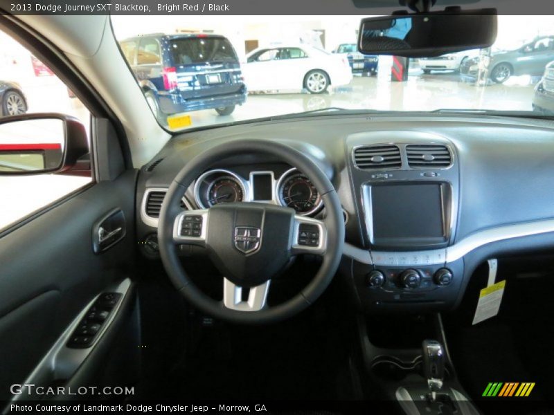 Dashboard of 2013 Journey SXT Blacktop
