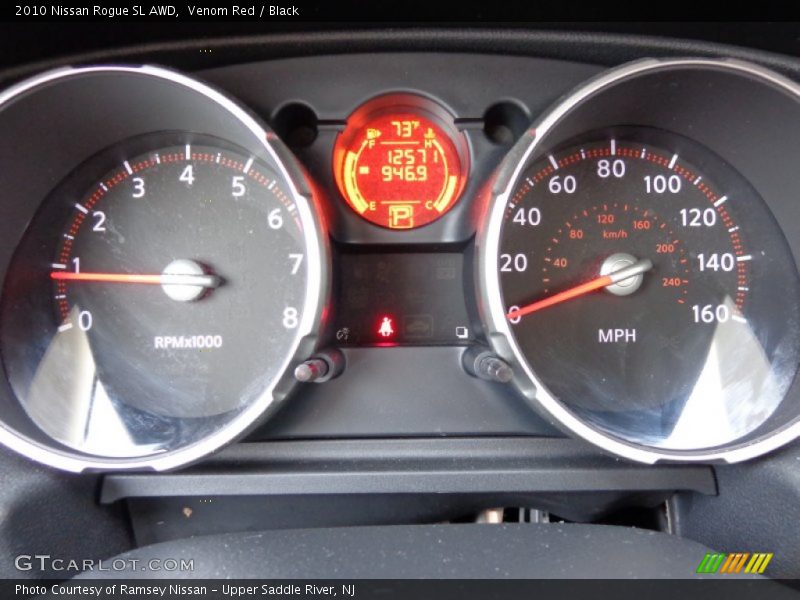 Venom Red / Black 2010 Nissan Rogue SL AWD