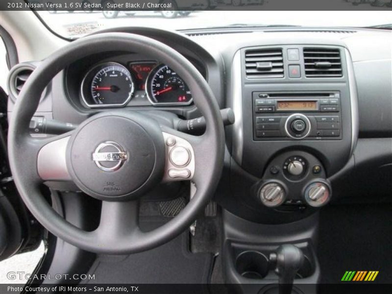 Super Black / Charcoal 2012 Nissan Versa 1.6 SV Sedan
