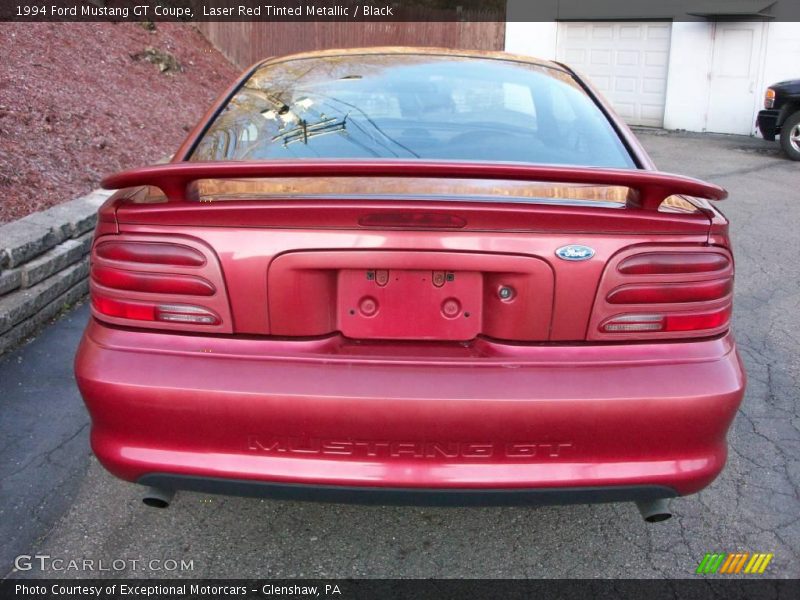 Laser Red Tinted Metallic / Black 1994 Ford Mustang GT Coupe