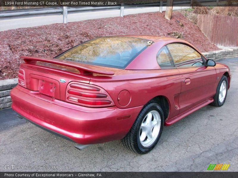 Laser Red Tinted Metallic / Black 1994 Ford Mustang GT Coupe