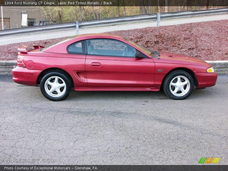 Laser Red Tinted Metallic / Black 1994 Ford Mustang GT Coupe