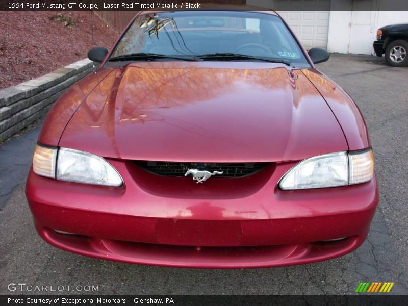 Laser Red Tinted Metallic / Black 1994 Ford Mustang GT Coupe