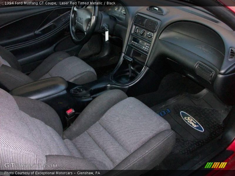 Laser Red Tinted Metallic / Black 1994 Ford Mustang GT Coupe