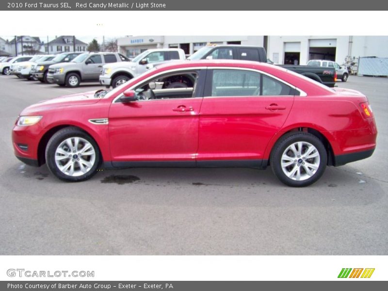 Red Candy Metallic / Light Stone 2010 Ford Taurus SEL