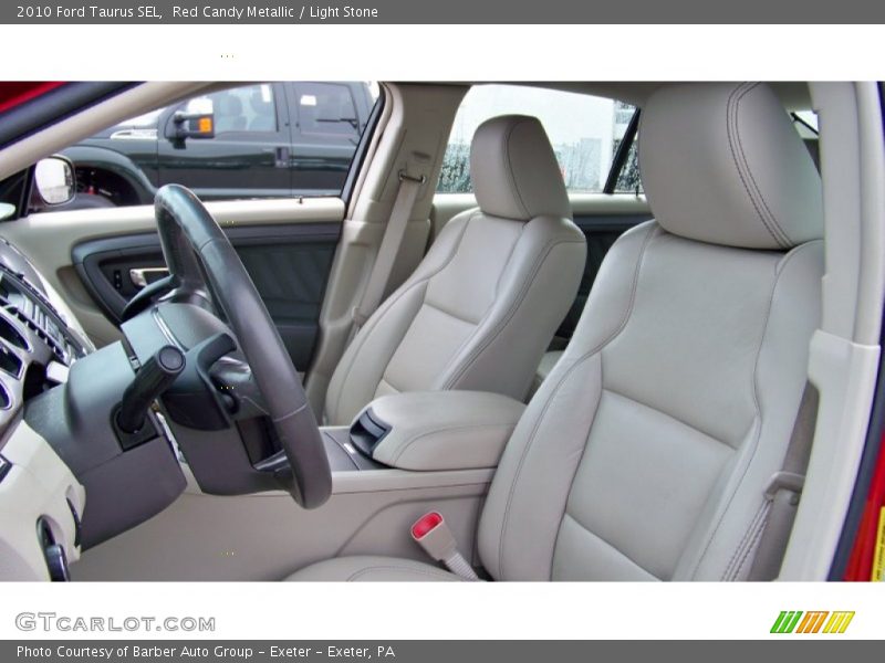 Red Candy Metallic / Light Stone 2010 Ford Taurus SEL