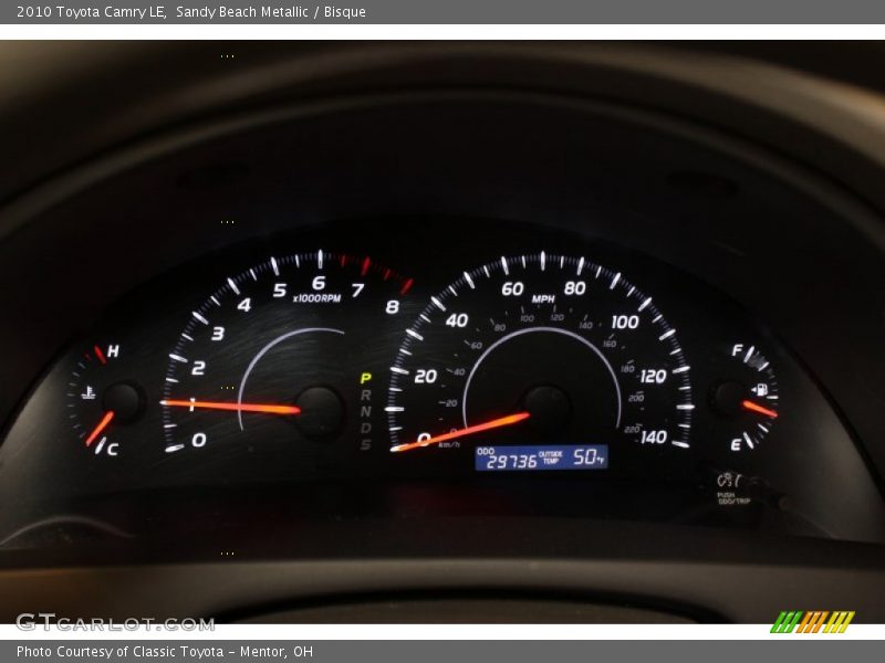 Sandy Beach Metallic / Bisque 2010 Toyota Camry LE