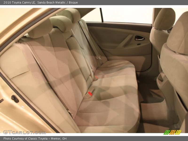 Sandy Beach Metallic / Bisque 2010 Toyota Camry LE