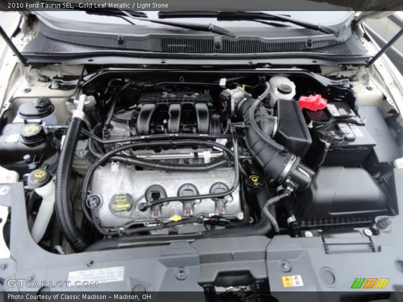Gold Leaf Metallic / Light Stone 2010 Ford Taurus SEL