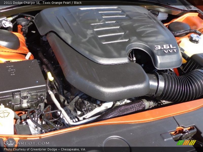 Toxic Orange Pearl / Black 2011 Dodge Charger SE
