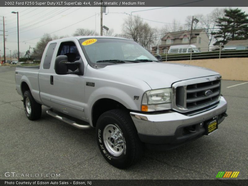 Front 3/4 View of 2002 F250 Super Duty XLT SuperCab 4x4